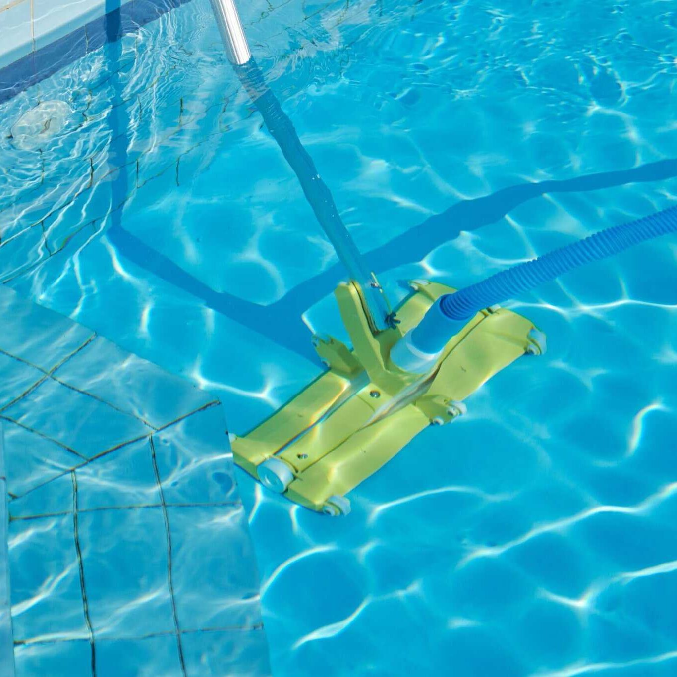 close up of outdoor swimming pool underwater, cleaning vacuum tube close up of outdoor swimming pool underwater, cleaning vacuum tube